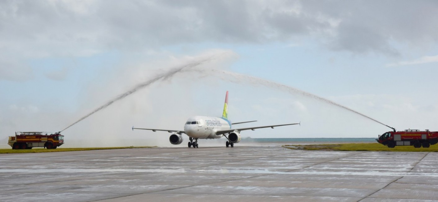 ‘Silhouette’ is welcomed by a traditional water cannon salute after landing at Seychelles International Airport