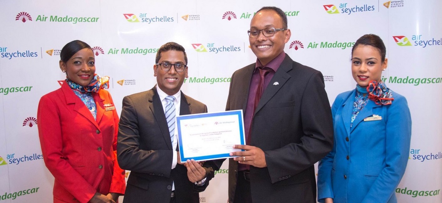 Manoj Papa, Air Seychelles’ Chief Executive Officer, and Hery Rambeloson, Air Madagascar’s Commercial Passenger Director, celebrate the signing of the new codeshare agreement between the two airlines