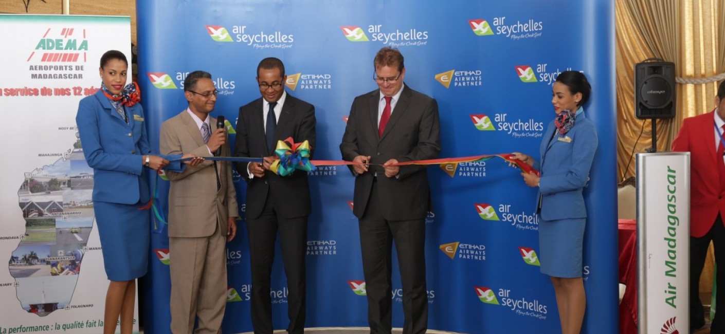 Madagascar’s Minister of Transport, Ulrich Andriatiana (centre left), and Justin Gosling, Air Seychelles’ General Manager Commercial, celebrate the launch of flights to Antananarivo