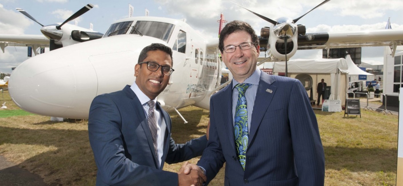 At the Farnborough Air Show in England, Air Seychelles Chief Executive Officer, Manoj Papa, and Viking Air President & Chief Executive Officer, David Curtis, celebrate the delivery of Air Seychelles’ new Twin Otter 400 Series aircraft