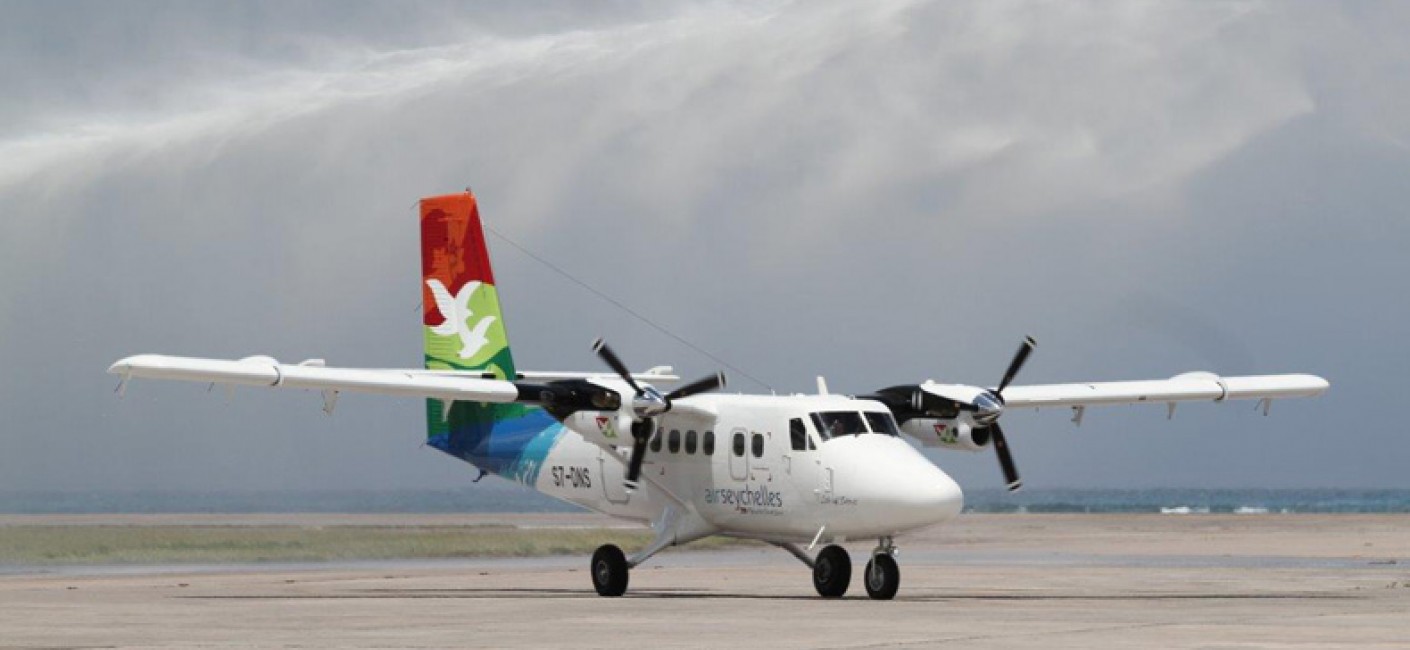 3.	Air Seychelles new twin otter Isle of Denis welcomed by the water cannon salute at Mahe International Airport, Seychelles